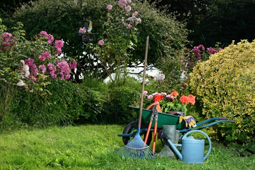 Gardening team inspecting an archway garden